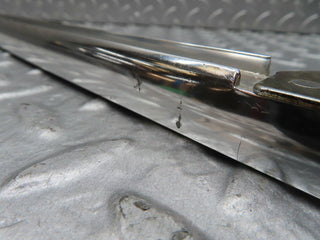 W123 rear left chrome window channel used OEM