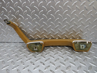 W123 left interior door handle palomino used OEM