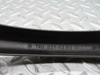 W140 boot hinge plastic cover left side used OEM