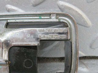 W108 chrome frame for door opener left used OEM