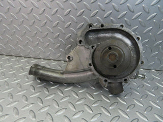 W124 water pump used OEM