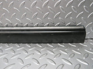 W123 front left door lower moulding trim used OEM