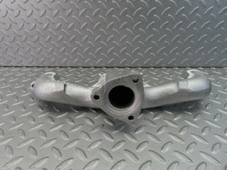 W115 exhaust manifold used OEM