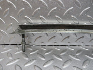 R107 SLC door window channel front left used OEM