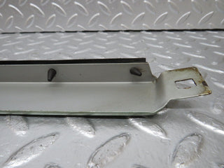 W124 under headlight trim right side used OEM