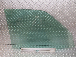 W124 Wagon front left door window glass used OEM