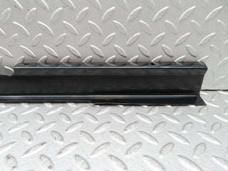W123 front left cable channel cover used OEM