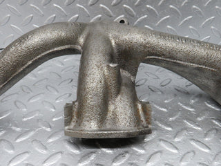 W123 exhaust manifold used OEM