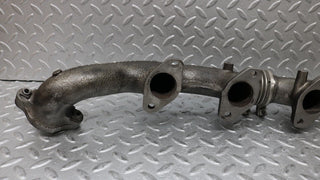 W126 Coupe exhaust manifold left side used OEM