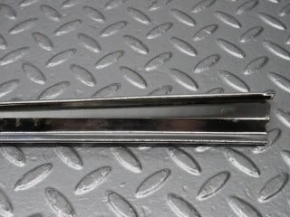 R107 SLC rear left window chrome used OEM