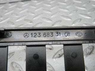 W123 dashboard switch console trim used OEM