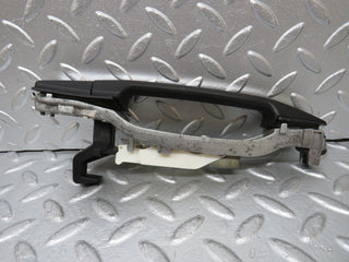 W124 rear left exterior door handle used OEM
