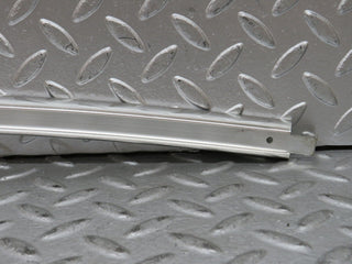 W123 rear left door chrome window channel used OEM
