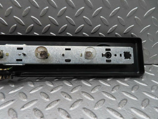 W123 tail light bulb holder left side used OEM