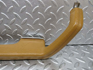 W123 left interior door handle palomino used OEM