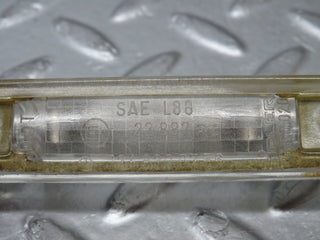 R129 SL number plate light used OEM