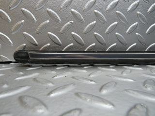 W123 front left fender wing centre moulding trim used OEM