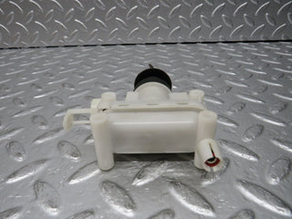 W124 Wagon door lock vacuum actuator front left used OEM