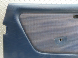 W123 Coupe front left door card blue used OEM
