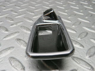 W123 Wagon chrome frame for door opener left used OEM