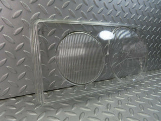 W123 headlight lens left used OEM