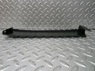 W116 headlight trim left side used OEM