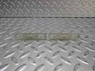 W124 Coupe number plate light pair used OEM