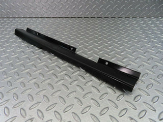 W123 cable channel cover front left used OEM