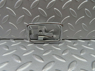W123 chrome frame for door opener left used OEM