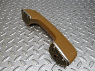 W123 interior door handle front right palomino used OEM