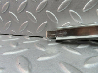 W123 rear right chrome window channel used OEM