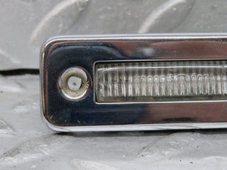 W109 number plate light chrome used OEM