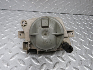 R129 SL front left fog light used OEM