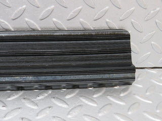 W123 front left door sill trim black used OEM
