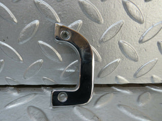 R107 SLC left interior chrome door latch trim used OEM