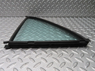 W123 rear left quarter window glass used OEM