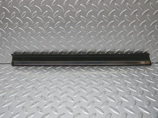W201 Baby Benz rear left door lower moulding trim used OEM