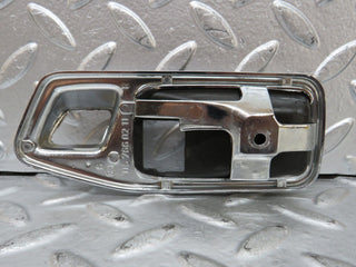 W123 chrome frame door opener rear right used OEM