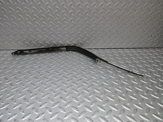 R129 SL left headlight lower trim used OEM