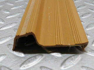 W123 front right door sill trim palomino used OEM