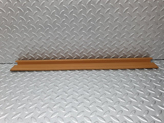 W124 front left door sill trim palomino used OEM