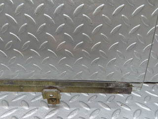 W123 rear left window glass used OEM