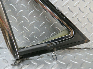 W114 front left quarter window used OEM