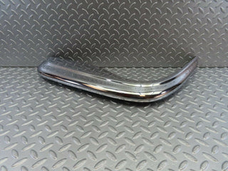 W108 front left upper bumper corner used OEM