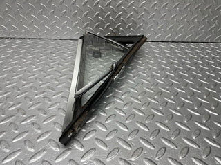 W108 front left quarter window used OEM