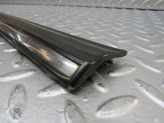 W123 front right door lower moulding trim used OEM