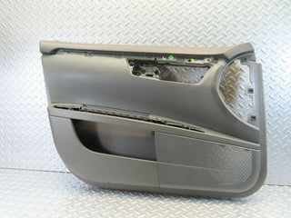 W221 front left door card used OEM