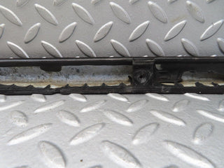 W123 tail light moulding trim left side used OEM