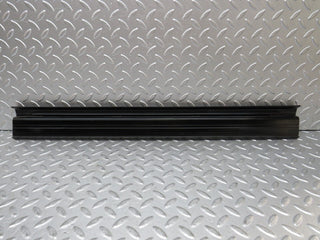 W123 front left door sill trim black used OEM