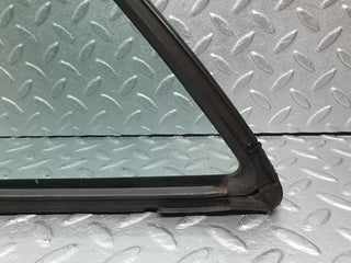W124 rear left quarter window glass used OEM